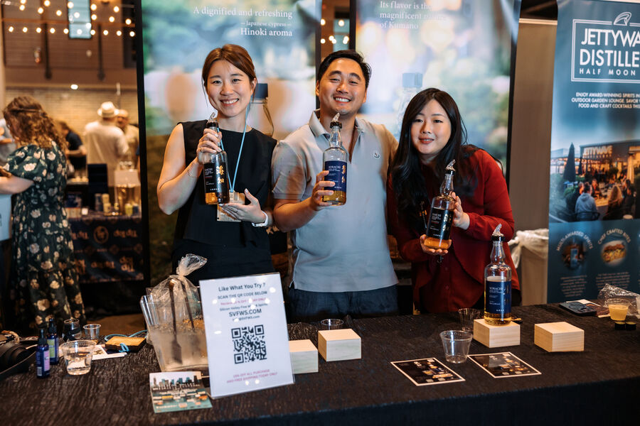 Festival attendees toasting and enjoying pours together